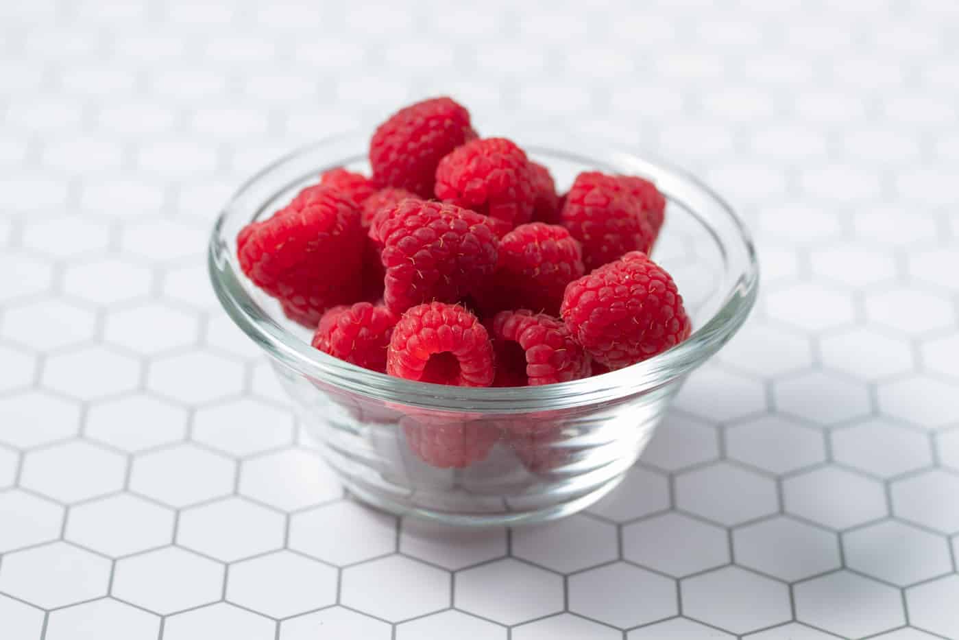 A bowl of raspberries.