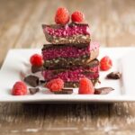 The layers of this raw chocolate raspberry slice work so well together; the chocolate nut base has the perfect crunch to it, the raspberry layer is soft and sweet and the chocolate layer will leave you wanting more. Thermomix method also included