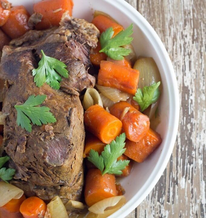 Slow Cooker Beef Pot Roast. A super yummy slow cooker meal that is full of flavour and packed full of healthy ingredients