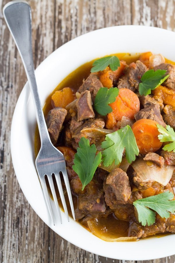 Slow Cooker Moroccan Lamb Stew. This meal is rich in flavour and so so tender, and very easy to make, meaning it's the perfect set-and-forget slow cooker meal.