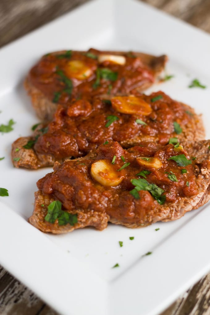 Veal Pizzaiola on a plate ready to eat.