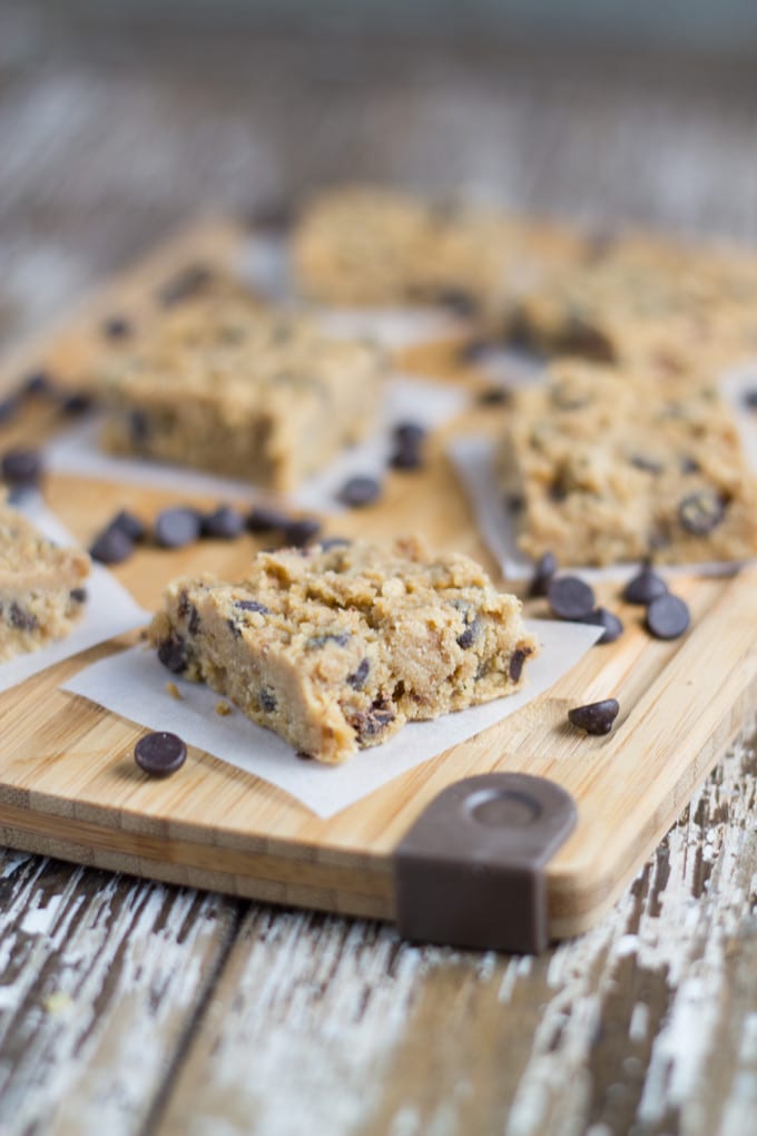 Raw Chocolate Chip Cookie Dough Bars. They are really easy to prepare, just mix the ingredients, spoon them into a lined square baking pan and place in the freezer to firm up.