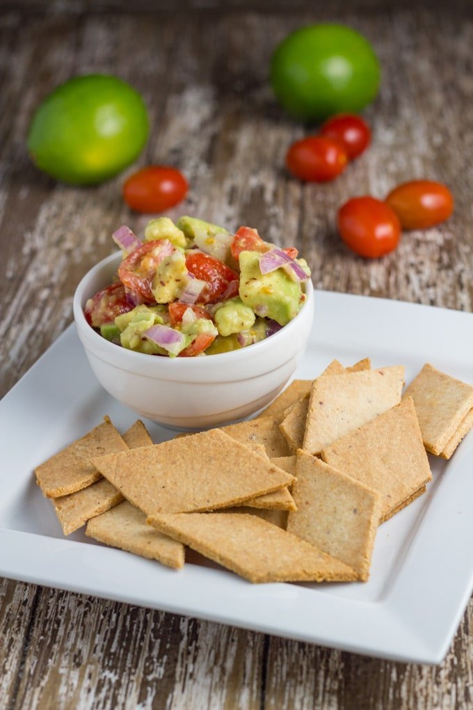 Paleo Crackers on a plate with guacamole.