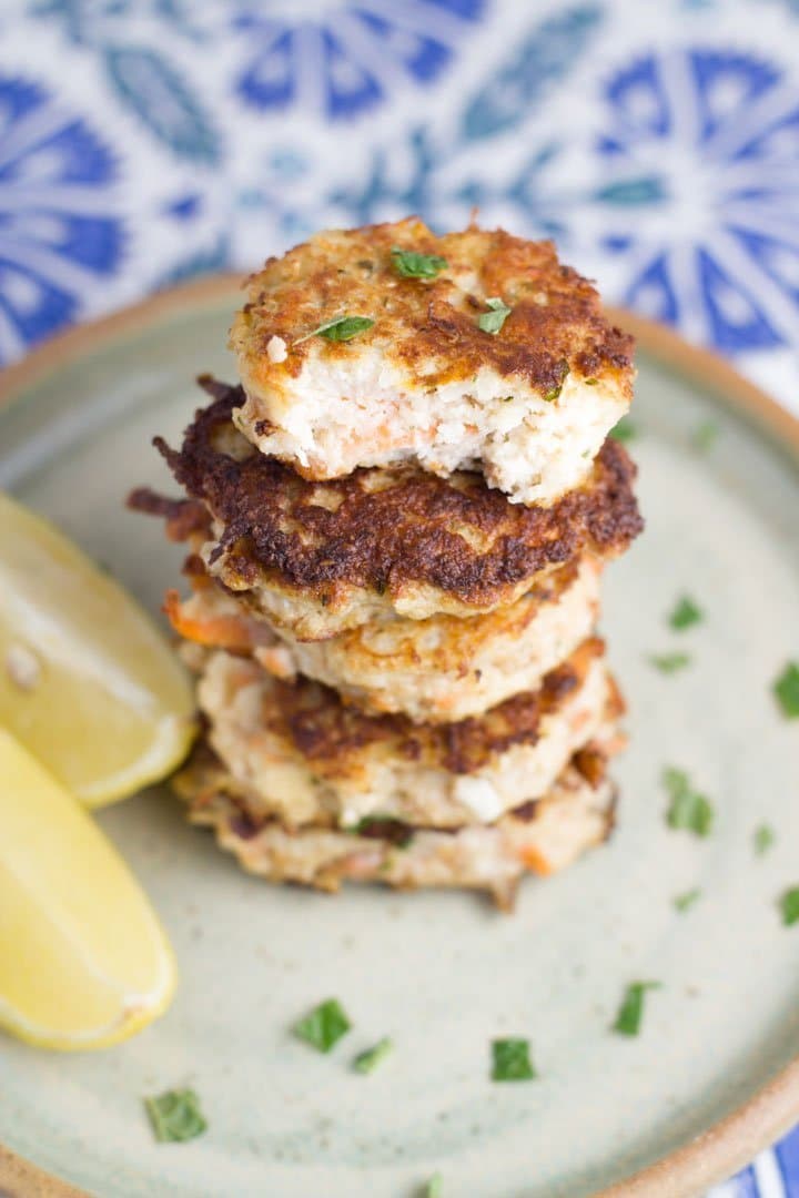 Stack of gluten free cauliflower fritters on a plate.