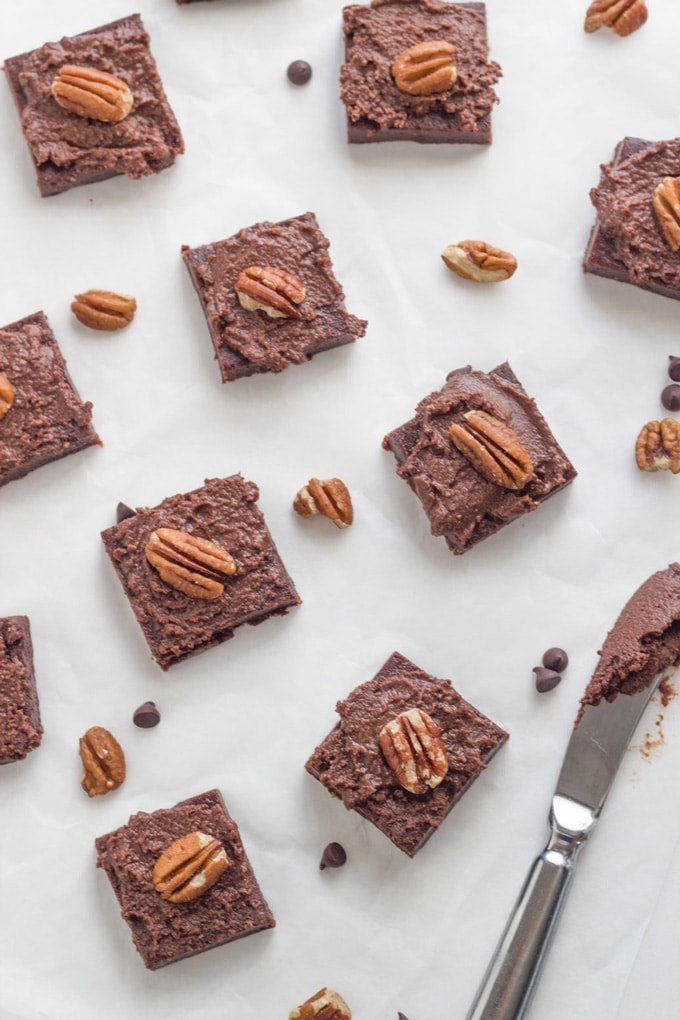 Brownies on a white board.