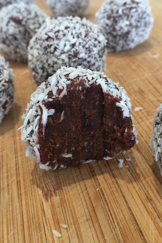 Gluten Free Chocolate Rum Balls on a board.