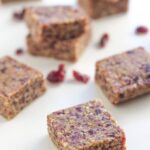 Raw Cranberry Date Bars are super easy to make and make the perfect travel snack or to put in your child's lunch box.