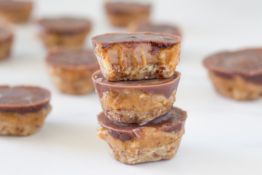 A stack of the raw treats on a white board.