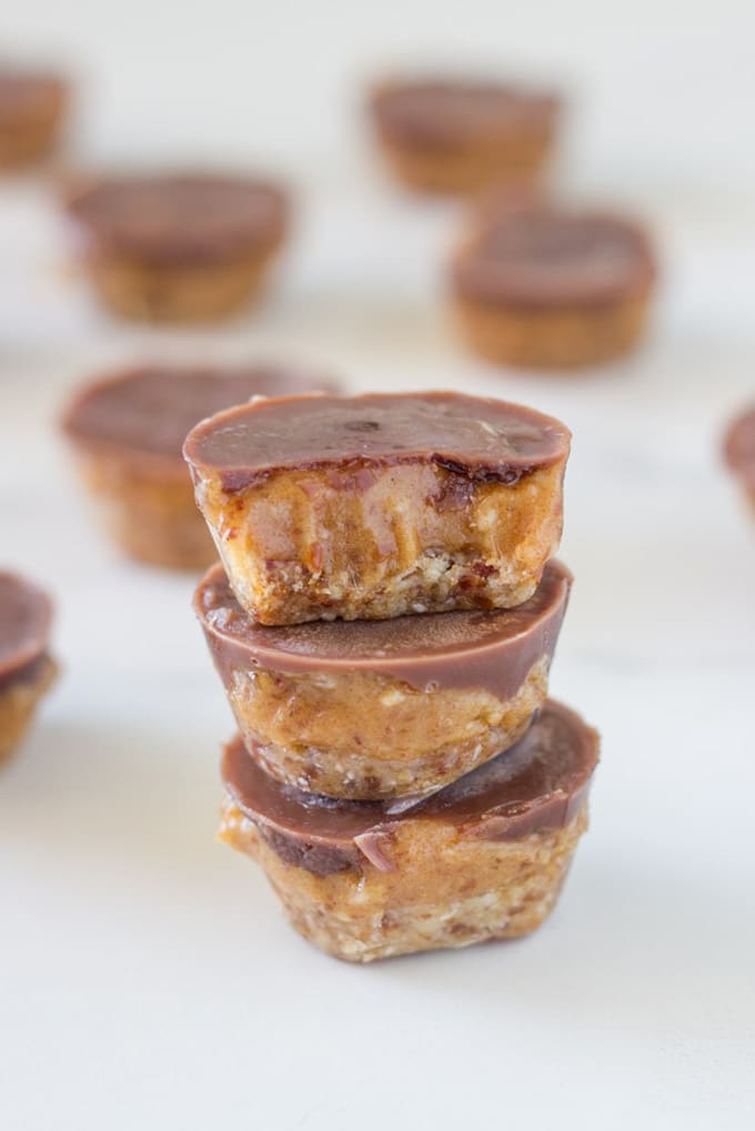 Stack of Raw caramel slice bites.