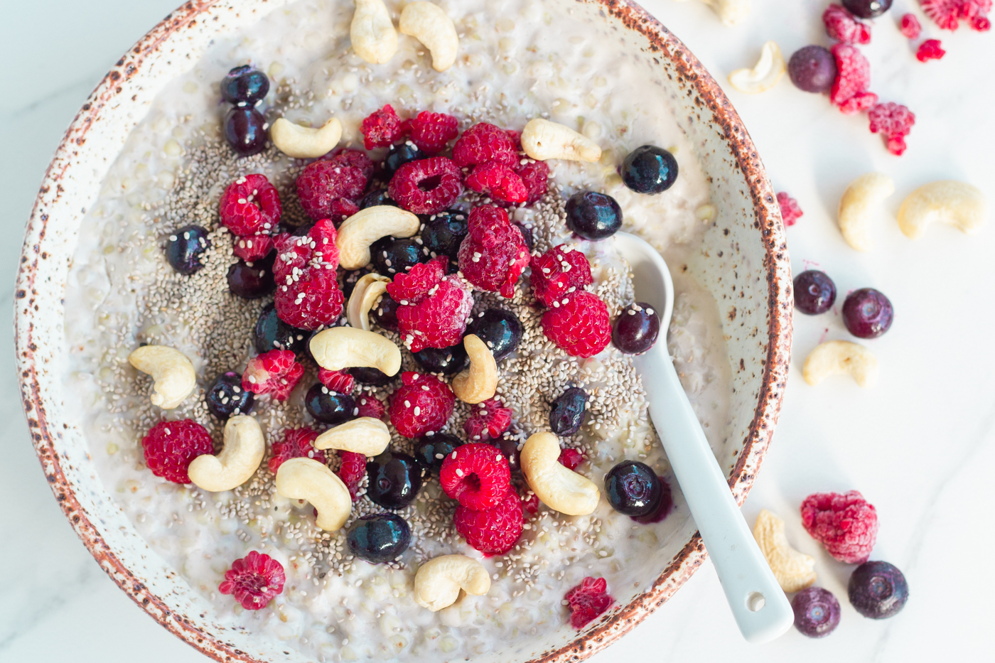 Bowl of porridge with toppings on top.