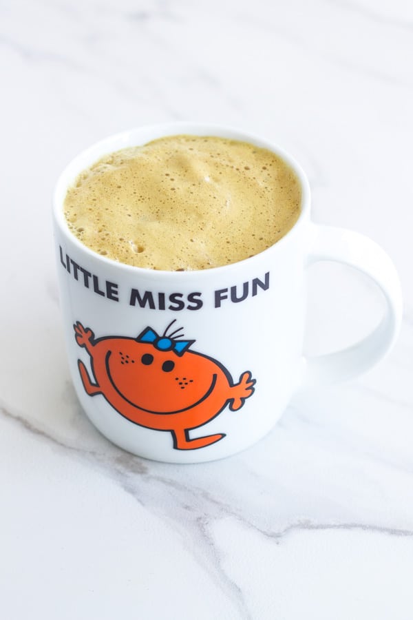 Turmeric Hot Chocolate on a white bench top.