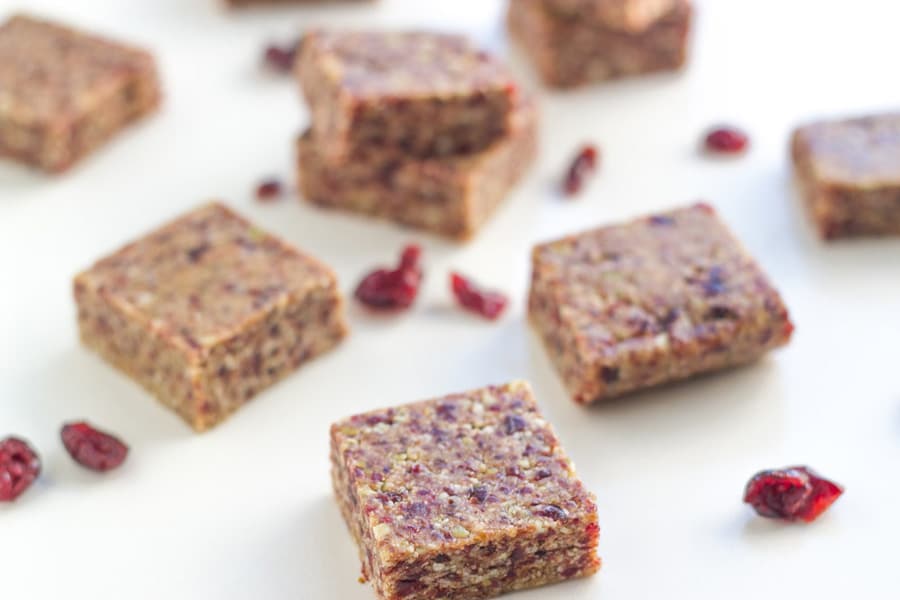 raw fruit bars on white board.