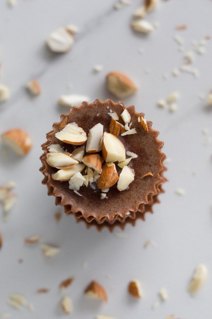 Fat bombs with chopped nuts around them.