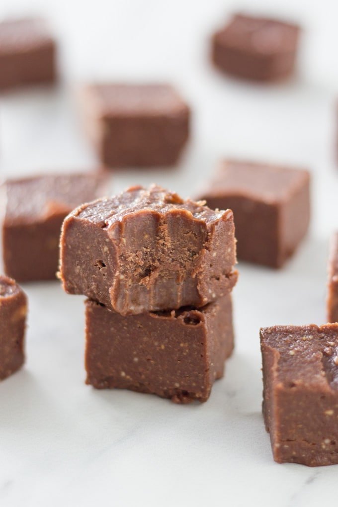 Piece of chocolate fudge on a the kitchen bench.