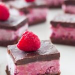 These Raw Chocolate Raspberry Brownies will become your favourite raw dessert! These brownies are made up of three layers that go so beautifully together - the 'chocolatey' brownie base, the 'gorgeous' raspberry layer and to top it off a layer of raw chocolate. |