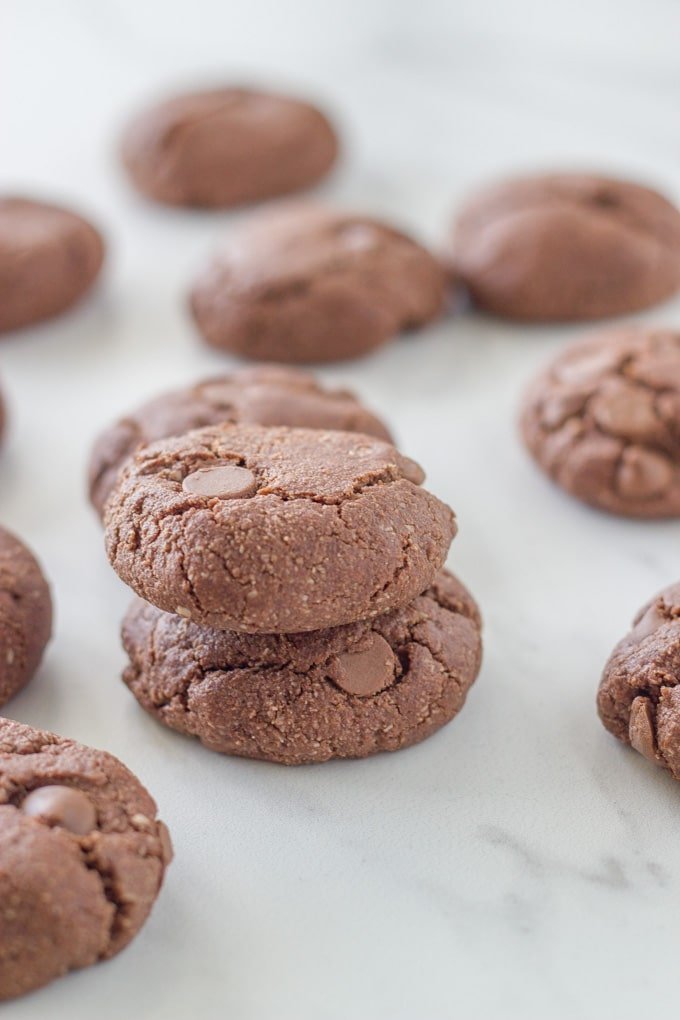 lots of cookies on white marble kitchen bench