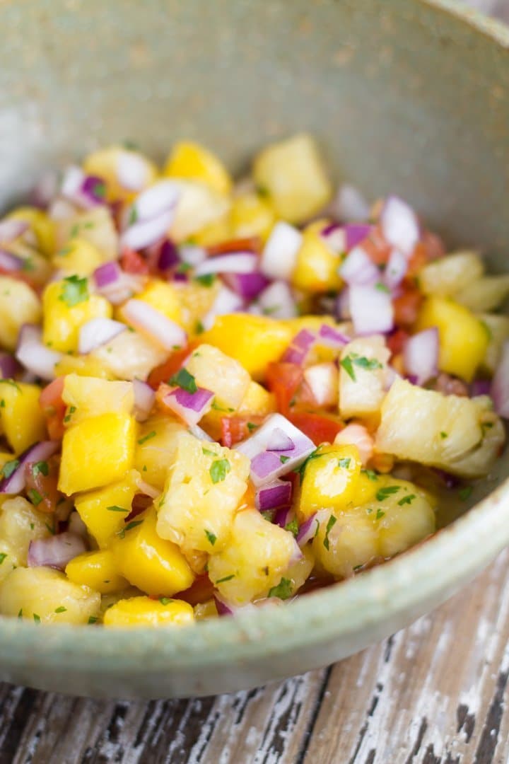 A bowl of mango pineapple salsa.