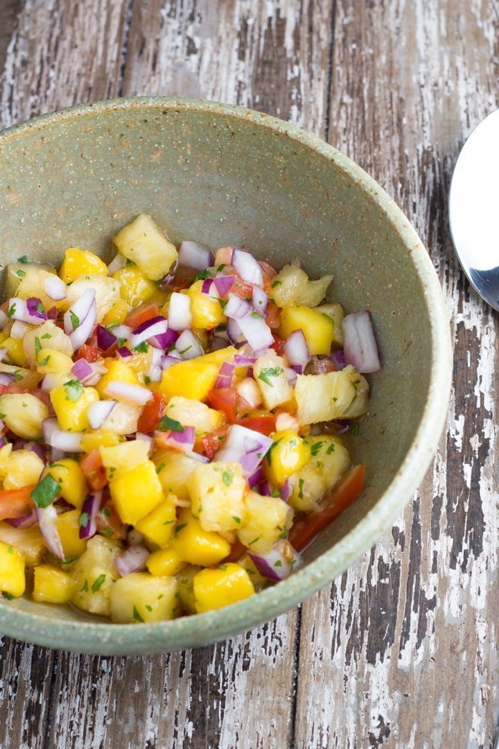 This mango pineapple salsa is sure to be a hit at your next summer bbq. It also works amazingly with mexican food or chicken, fish or pork dishes.