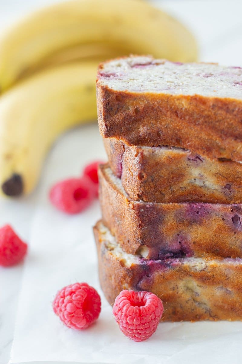 4 slices of banana bread stacked on top of each other.