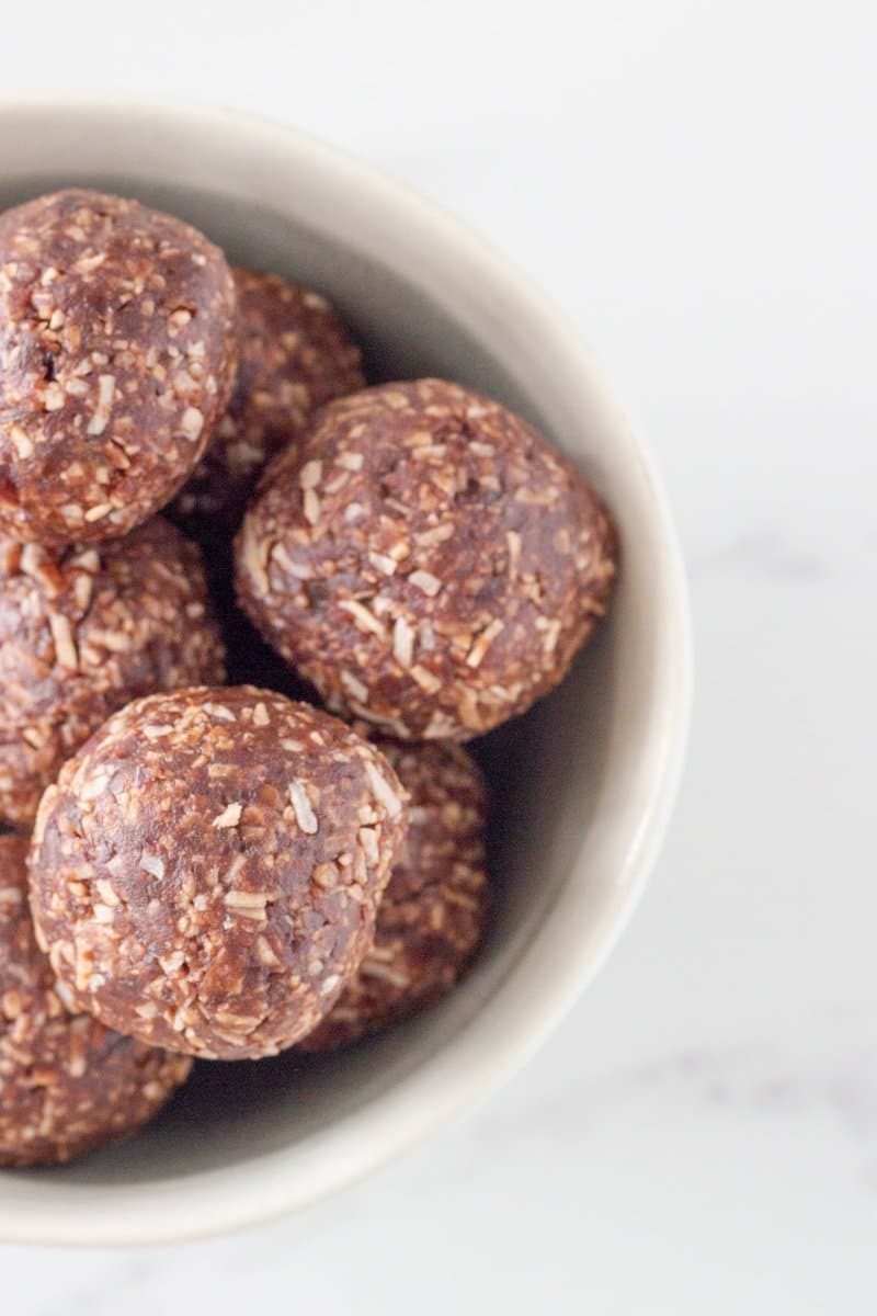 top down photo of the coconut rough bliss balls in a bowl.