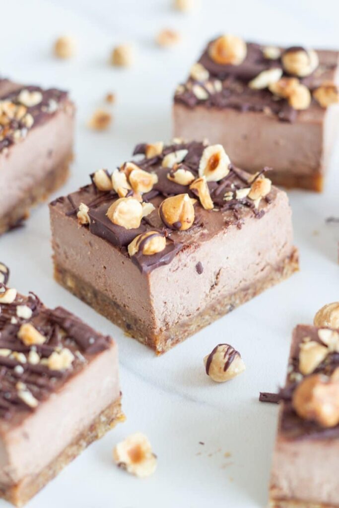 Raw Nutella slice. This delicious no-bake bar is made with my version of the super popular choc nutty spread but with way less sweetener (non-refined too) plus it is super easy to make.