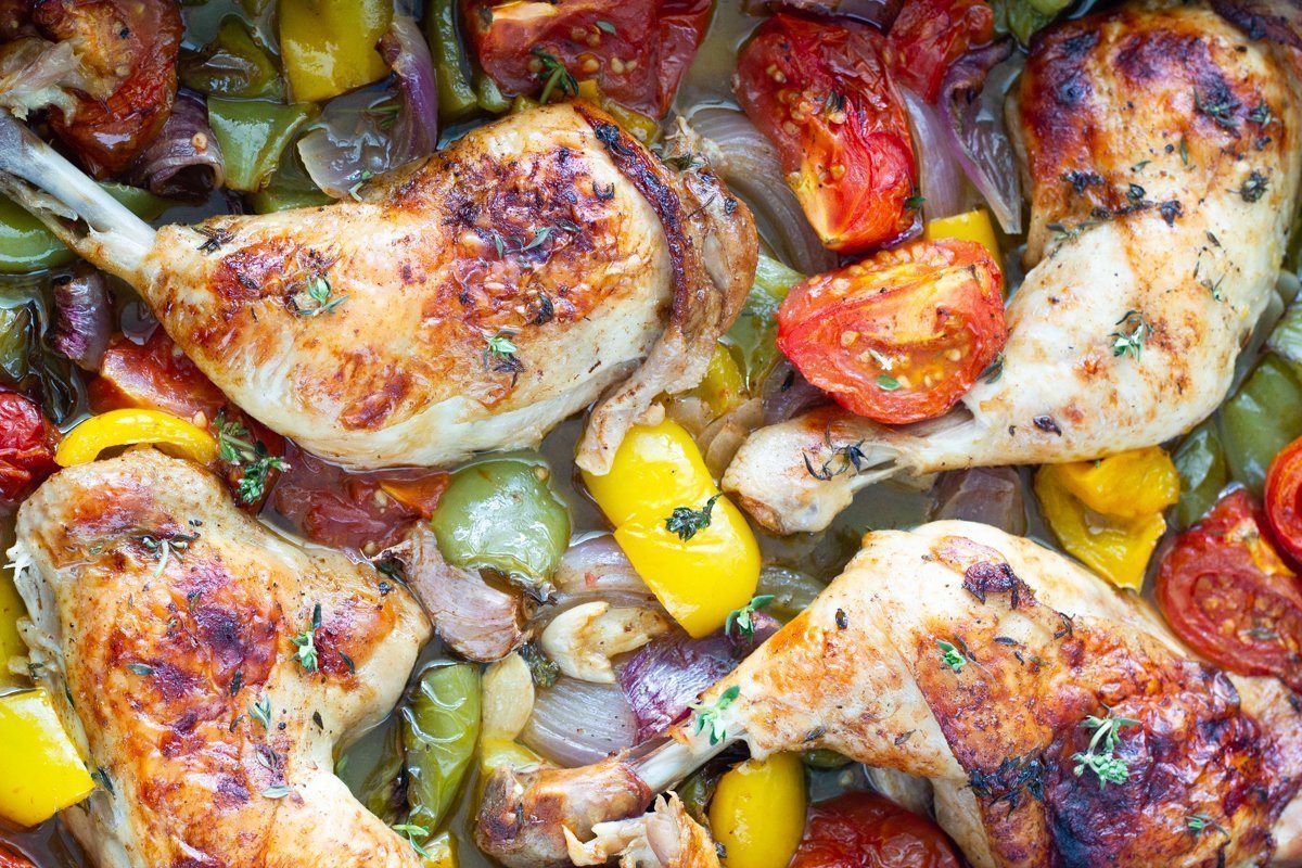 One tray oven baked chicken and vegetables is your weekly go-to roast chicken dish. This easy to make one pan dinner is made with a delicious marinade and easy to prep vegetables.