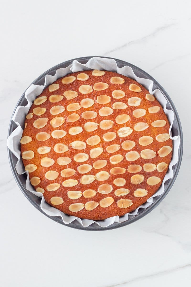 orange almond cake in the cake tin