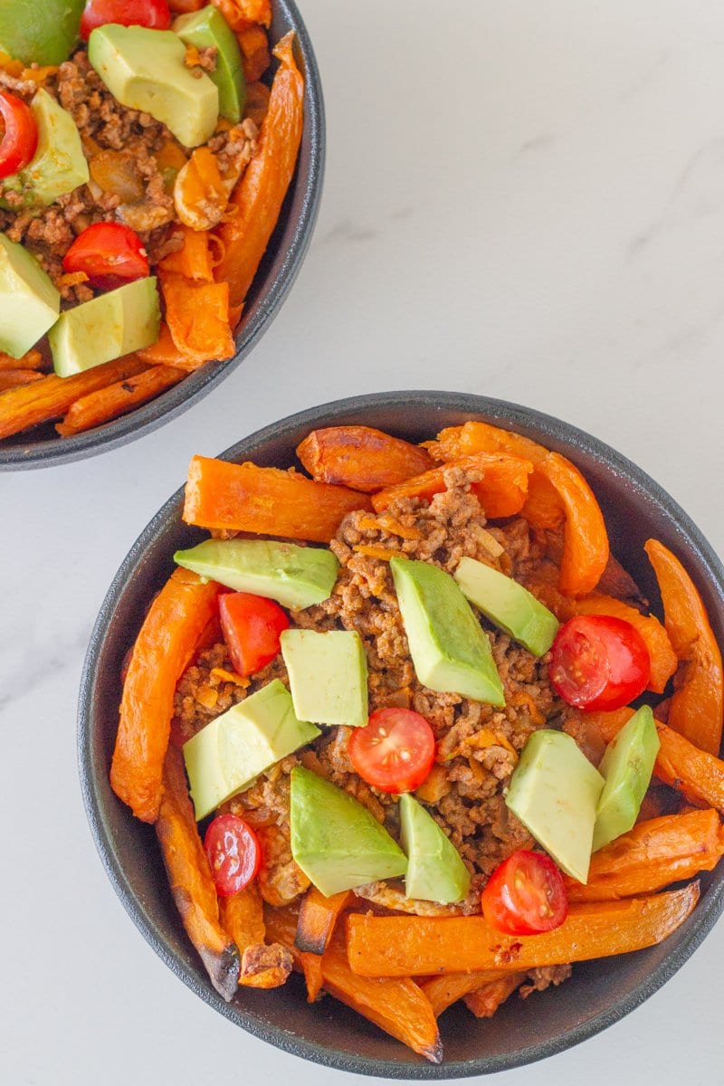 Healthy Loaded taco fries topped with beef mince, avocado and tomato.