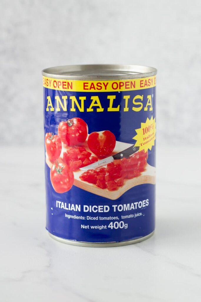 Basic Italian Tomato Sauce - this is my family recipe which has been passed down from generation to generation. It is made with 4 simple ingredients - diced tomatoes, tomato paste, garlic and olive oil.