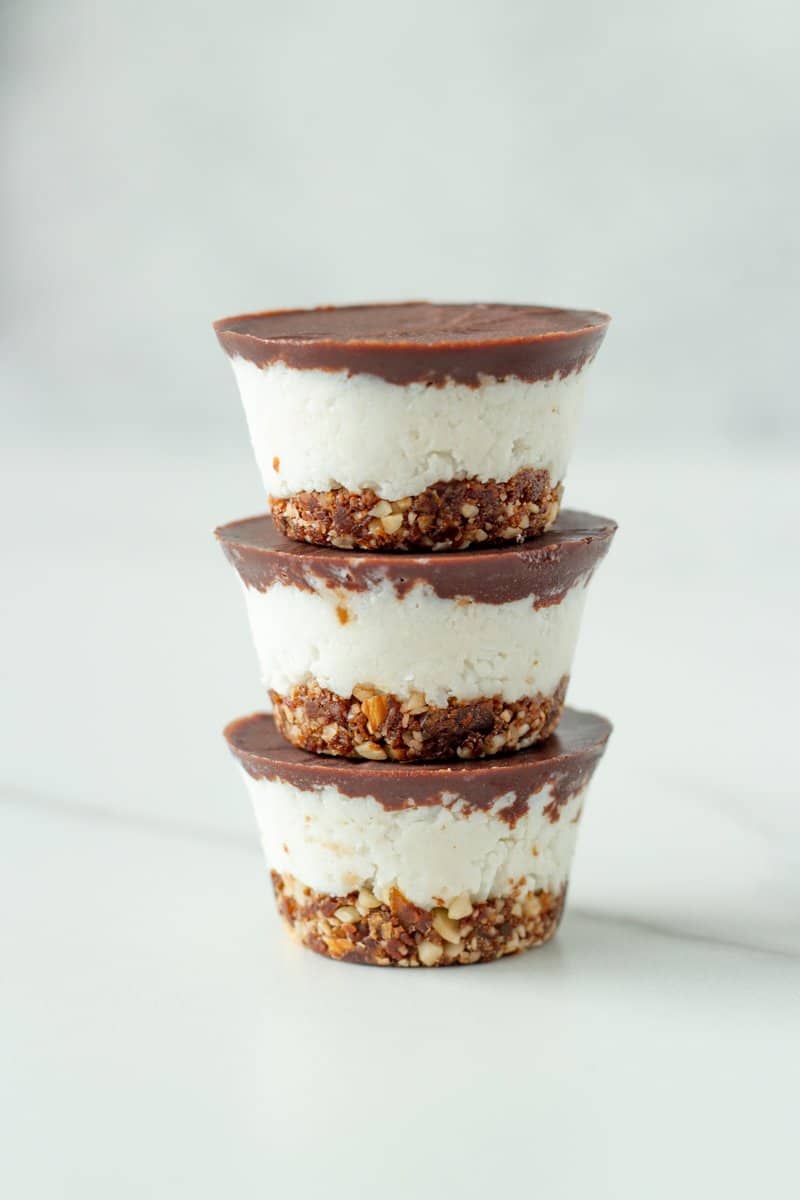 No Bake Bounty Slice Bites These delicious bite-sized raw slices are made with three layers, a chocolate nut base, creamy coconut centre and a raw chocolate layer on top.
