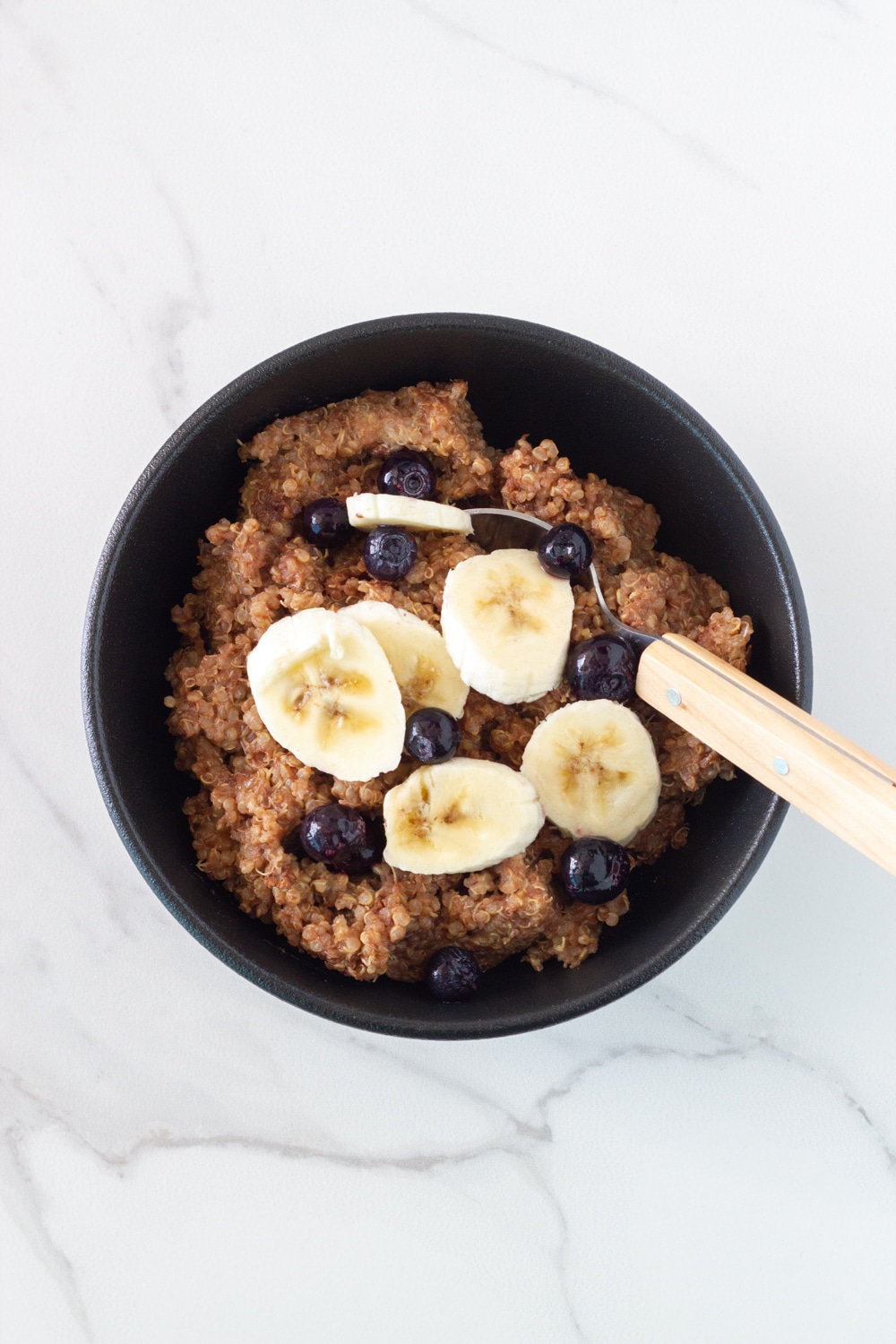 How the Chocolate Banana Quinoa Breakfast Bowl looks when ready to eat.