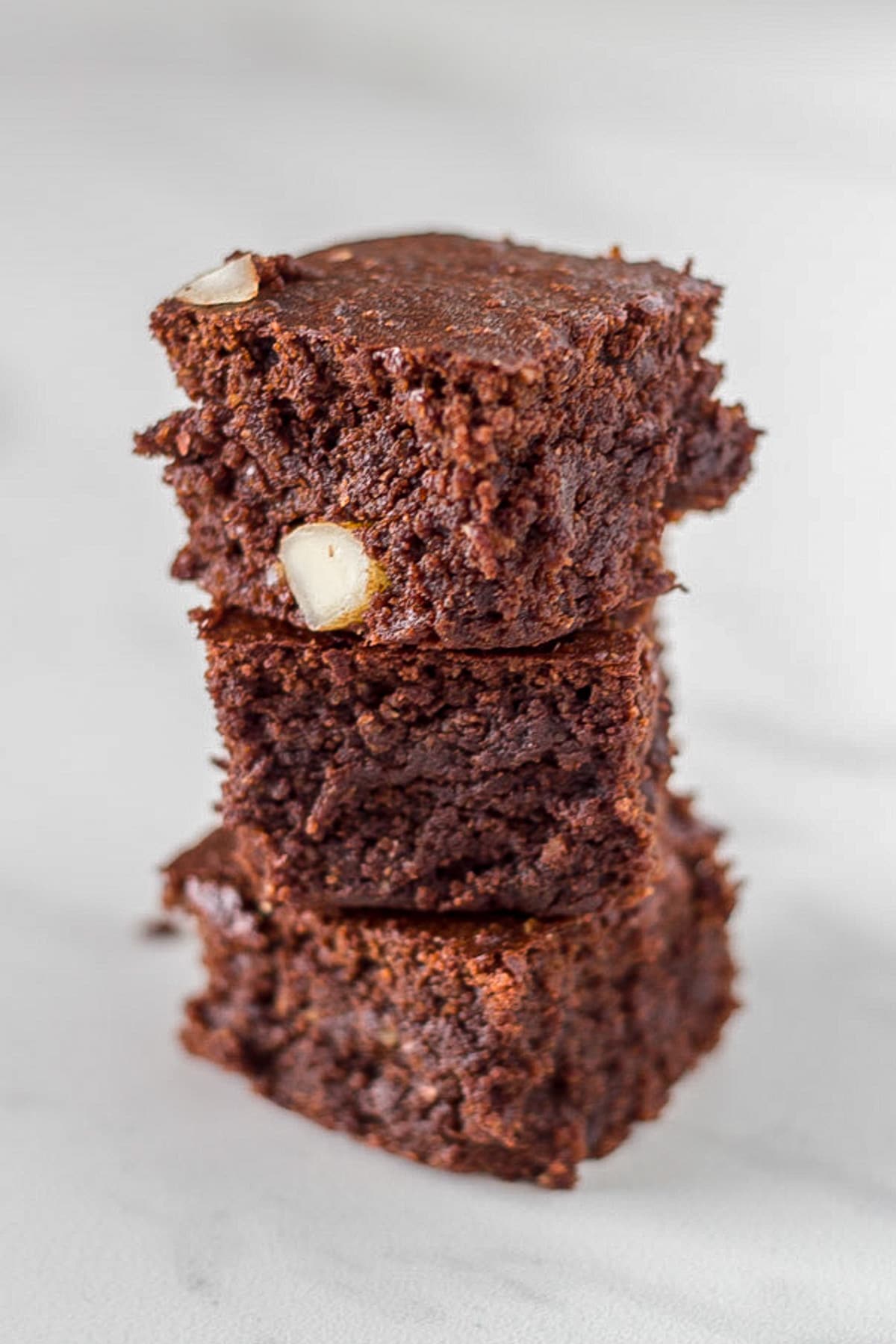 Stack of gluten free fudge brownies.