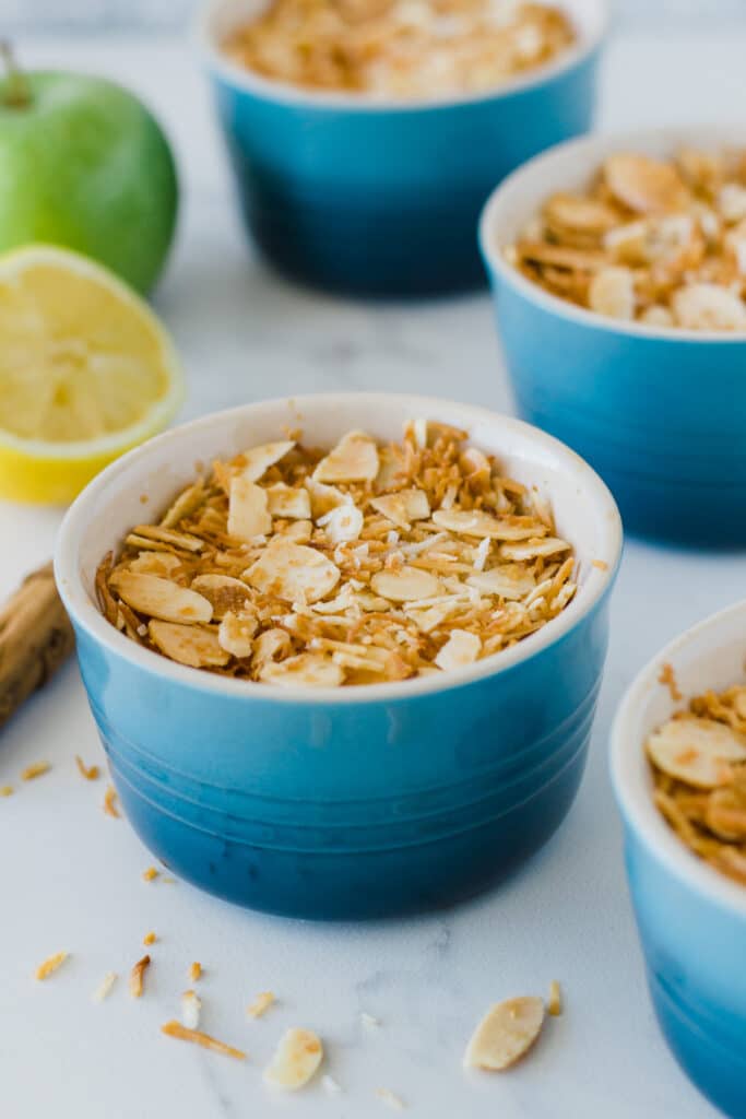 photo of 4 ramekins with cooked gluten free apple crumble