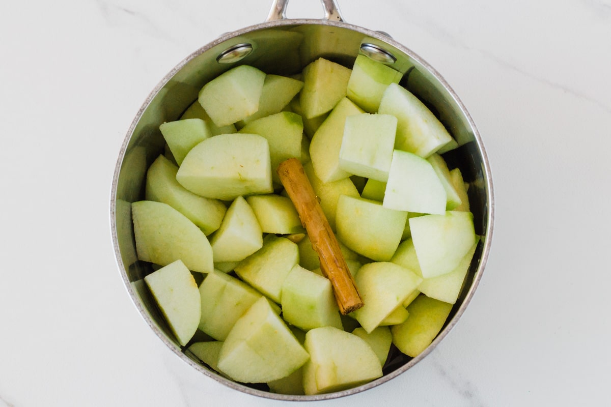 Apple mixture ingredients in a small saucepan.