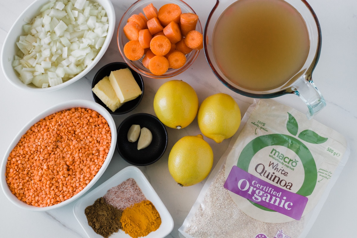 Ingredients you need to make the soup - onion, garlic, carrot, dried red lentils, butter, lemon, quinoa, stock, water and spices.