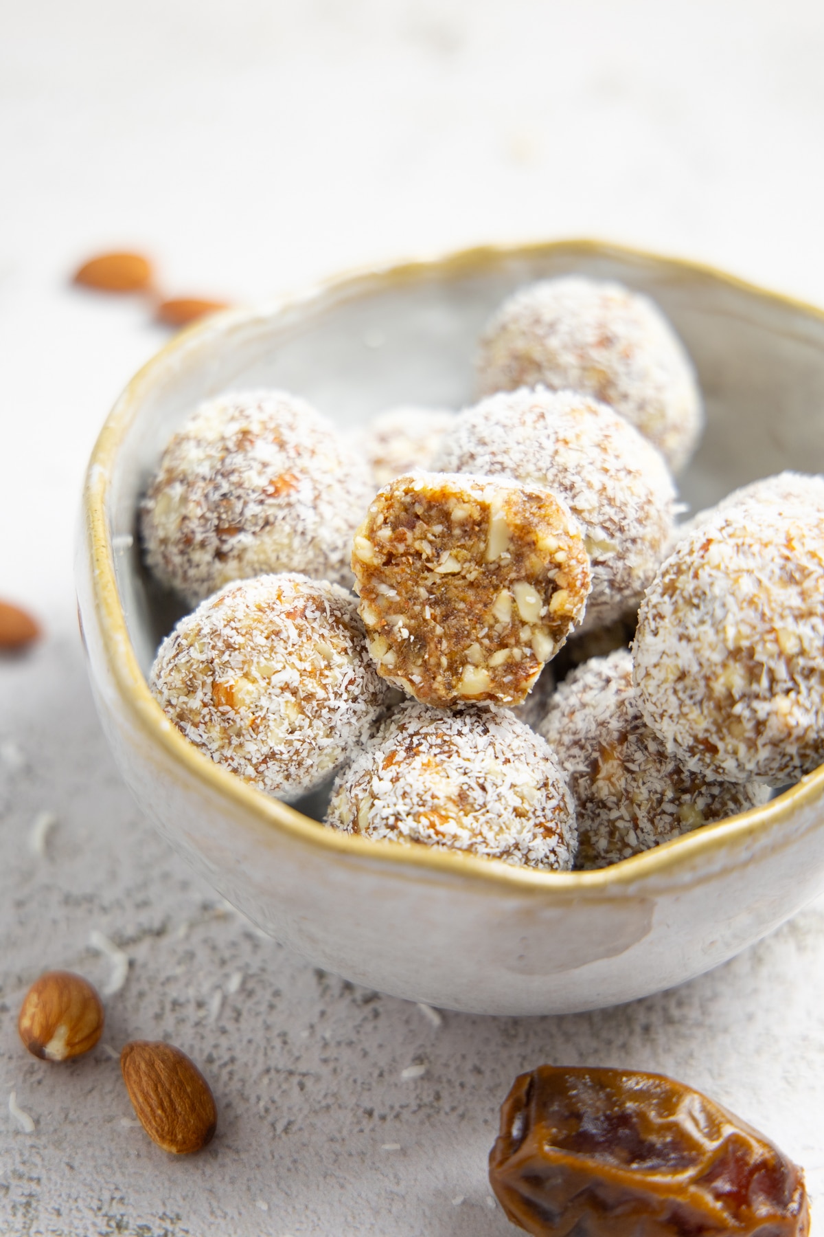 The salted caramel bliss balls in a bowl.