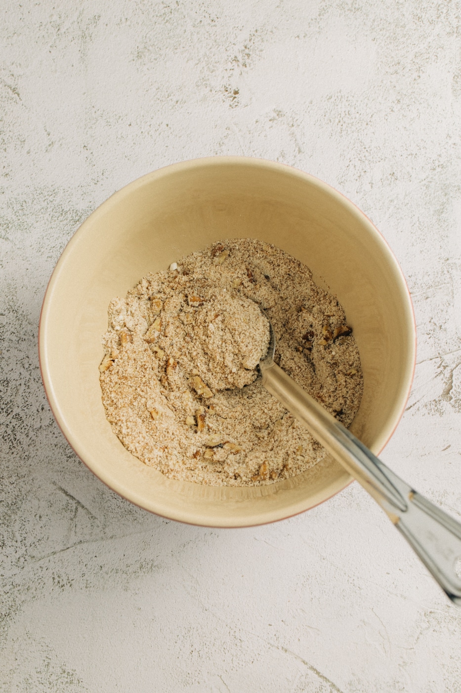 Image of dry ingredients combined together in a mixing bowl