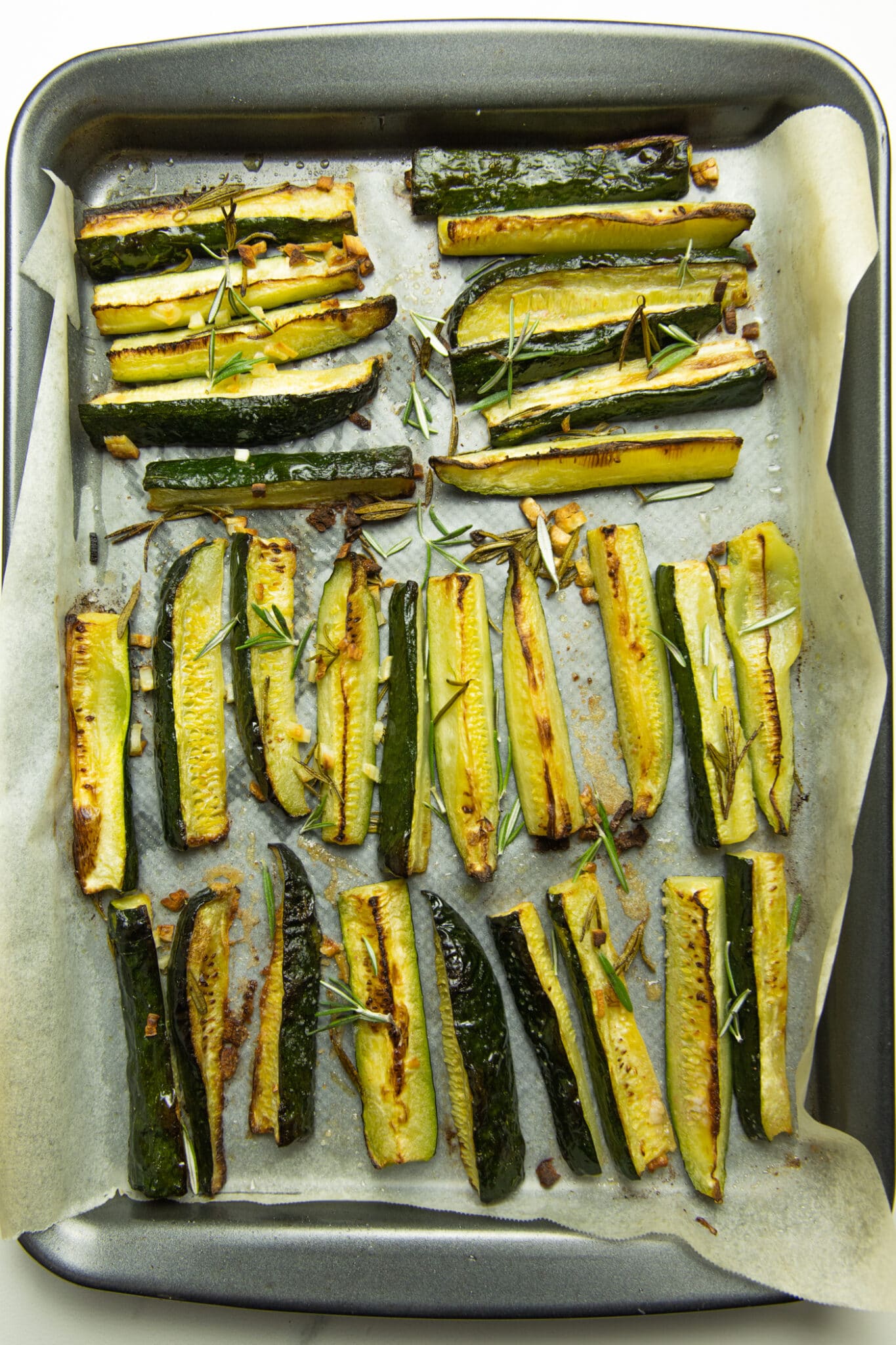 photo of oven baked zucchini wedges in tray