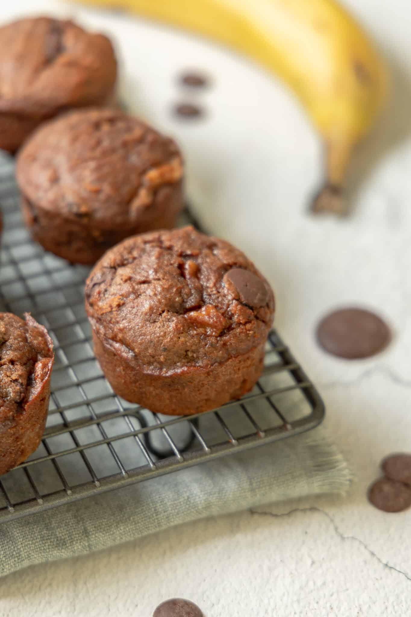 Cooked muffins on a cooling rack.