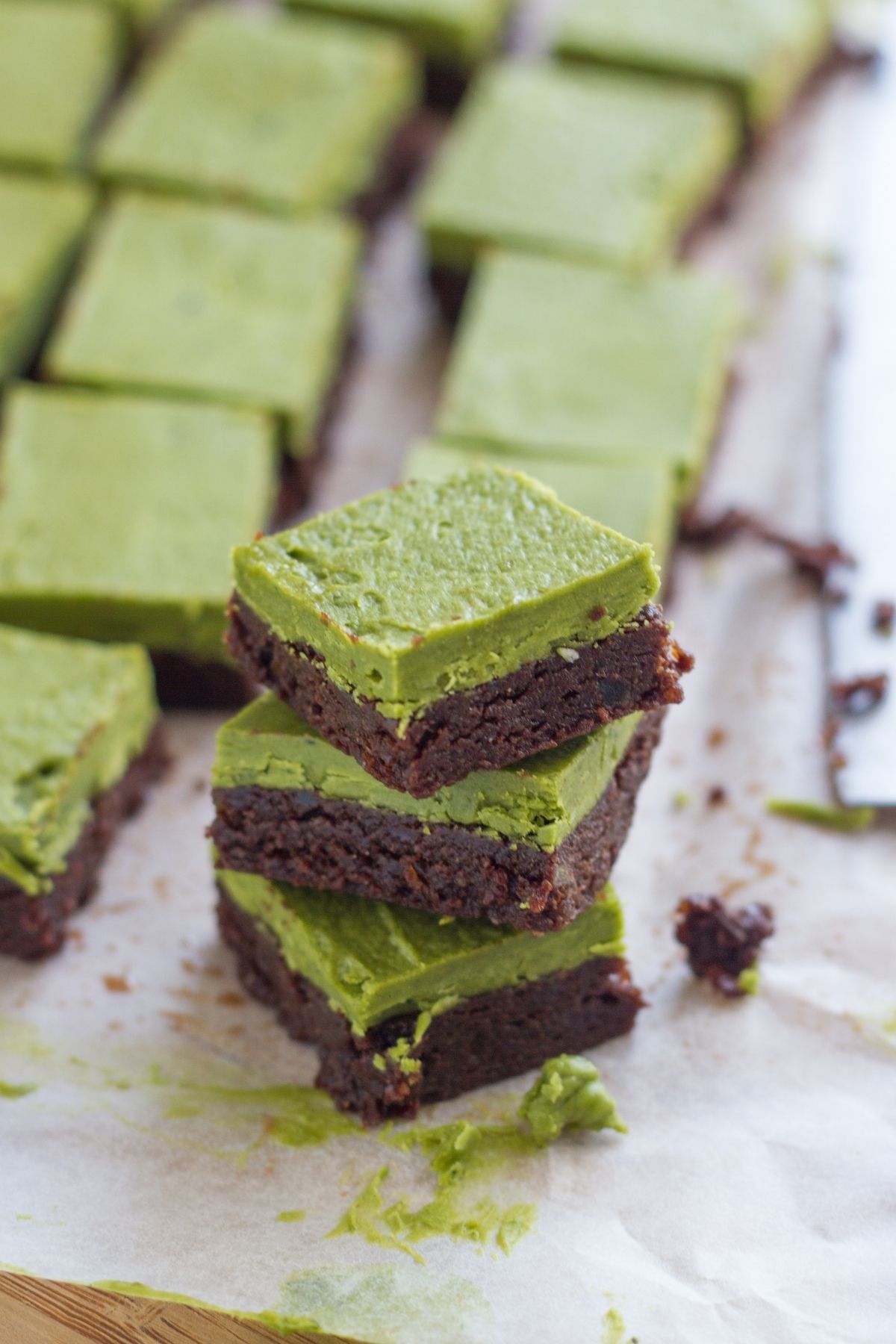 Matcha chocolate bars stacked on top of each other.
