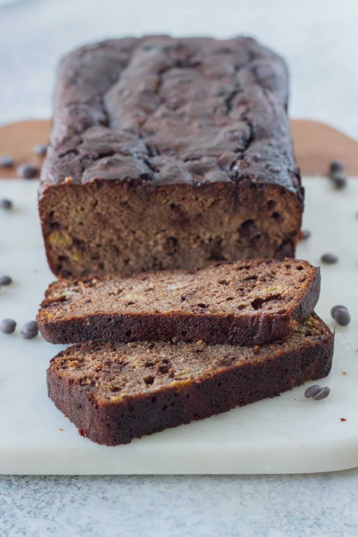 Freshly cooked Healthy Chocolate Banana Bread with a few slices cut.