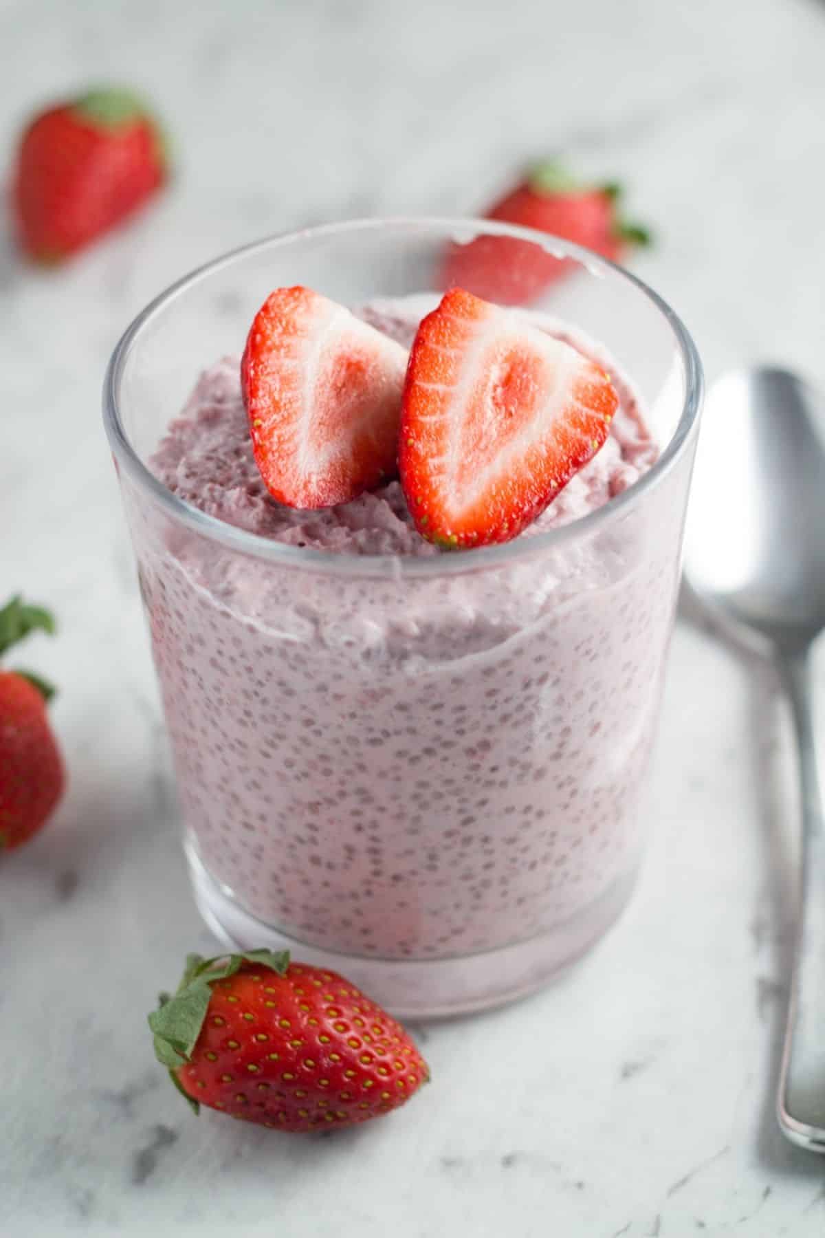 Strawberries and Cream Chia Pudding with some sliced strawberries on top.