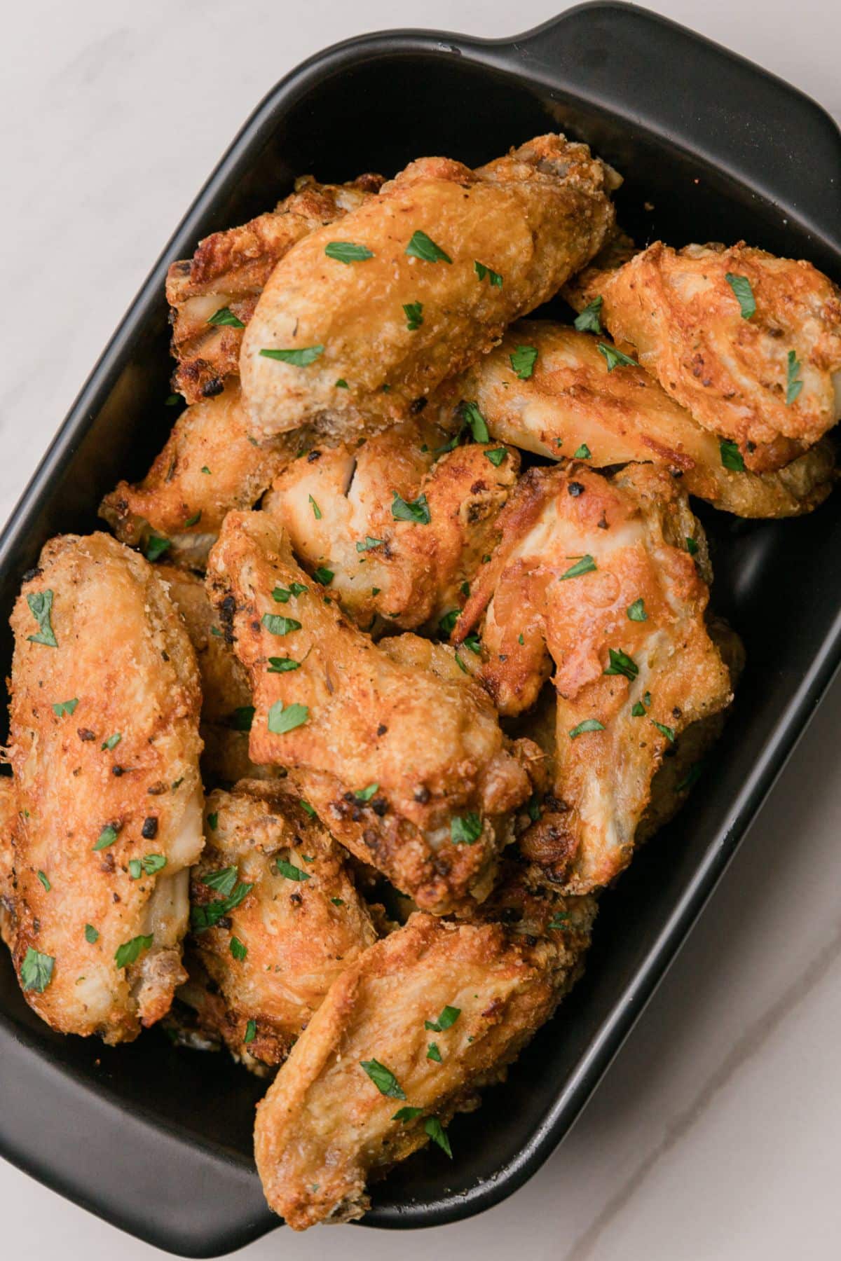 chicken wings in a dish.